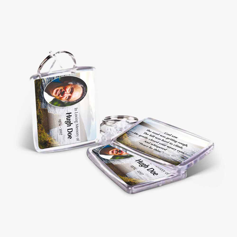 a key chain with a photo of a person