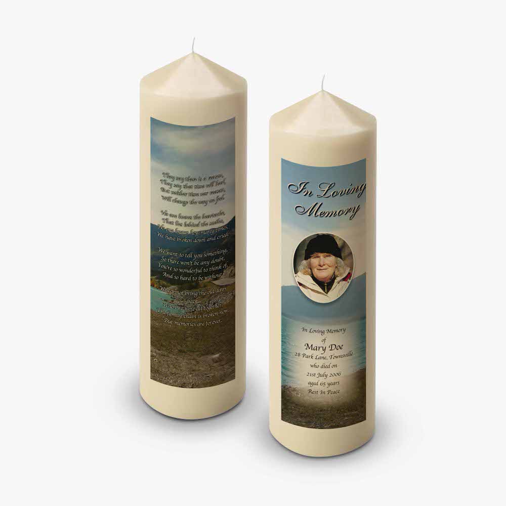 two candles with a photo of a man on them