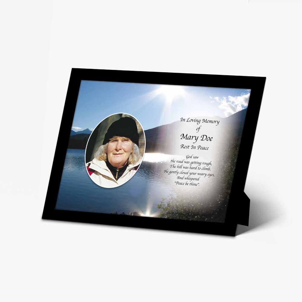 a memorial photo frame with a picture of a woman