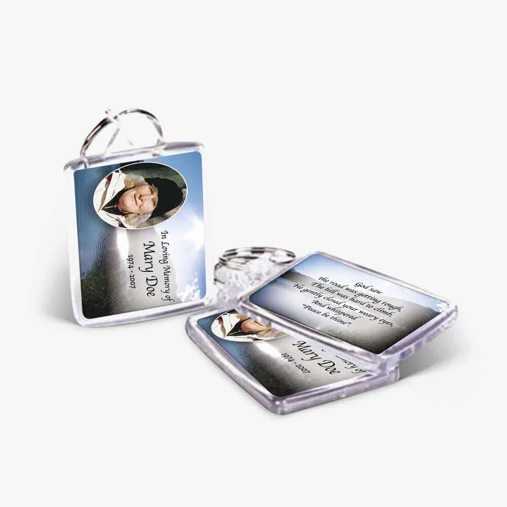 a photo of a person is on a key chain