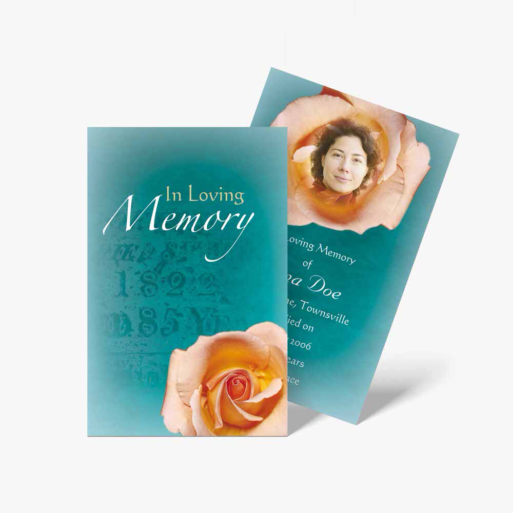 a memorial card with a rose on it