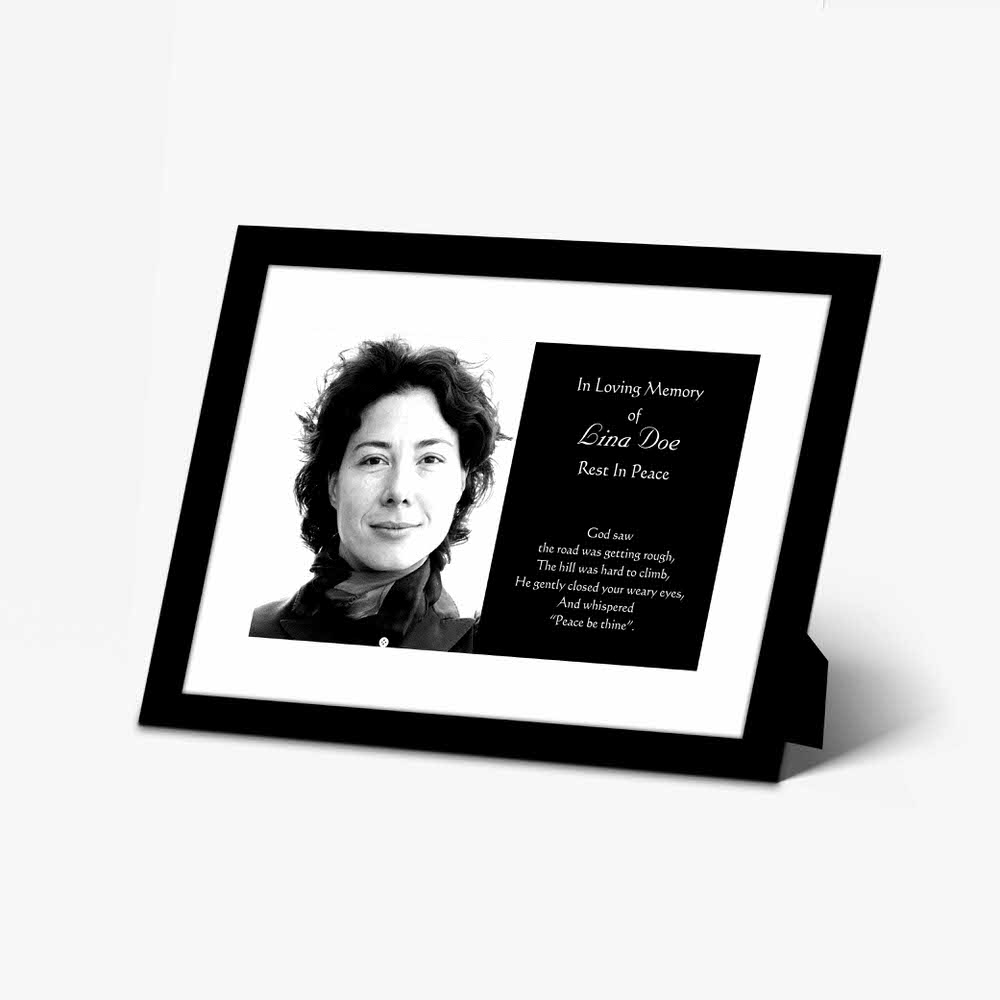 a black and white photo frame with a woman's picture