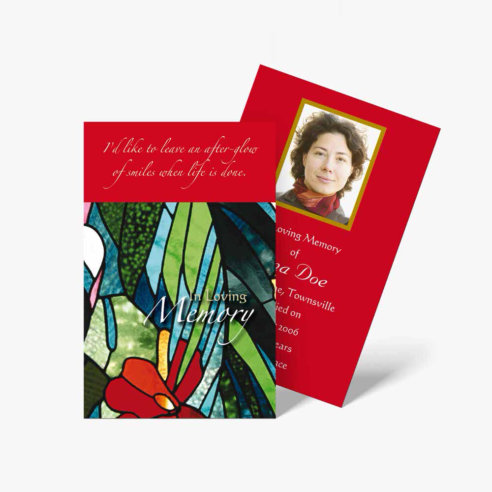 a red and green memorial card with a photo of a woman