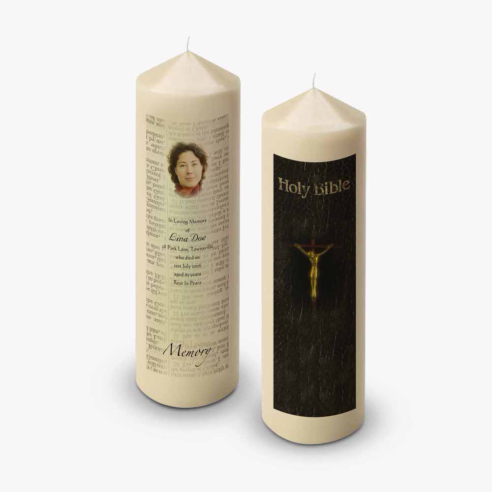 a candle with a picture of jesus on it