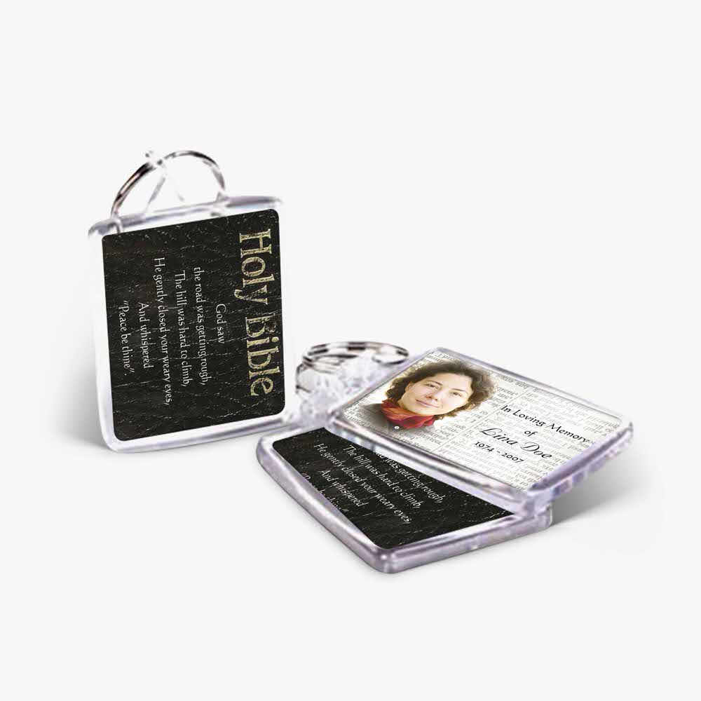 a small keychain with a photo of a woman