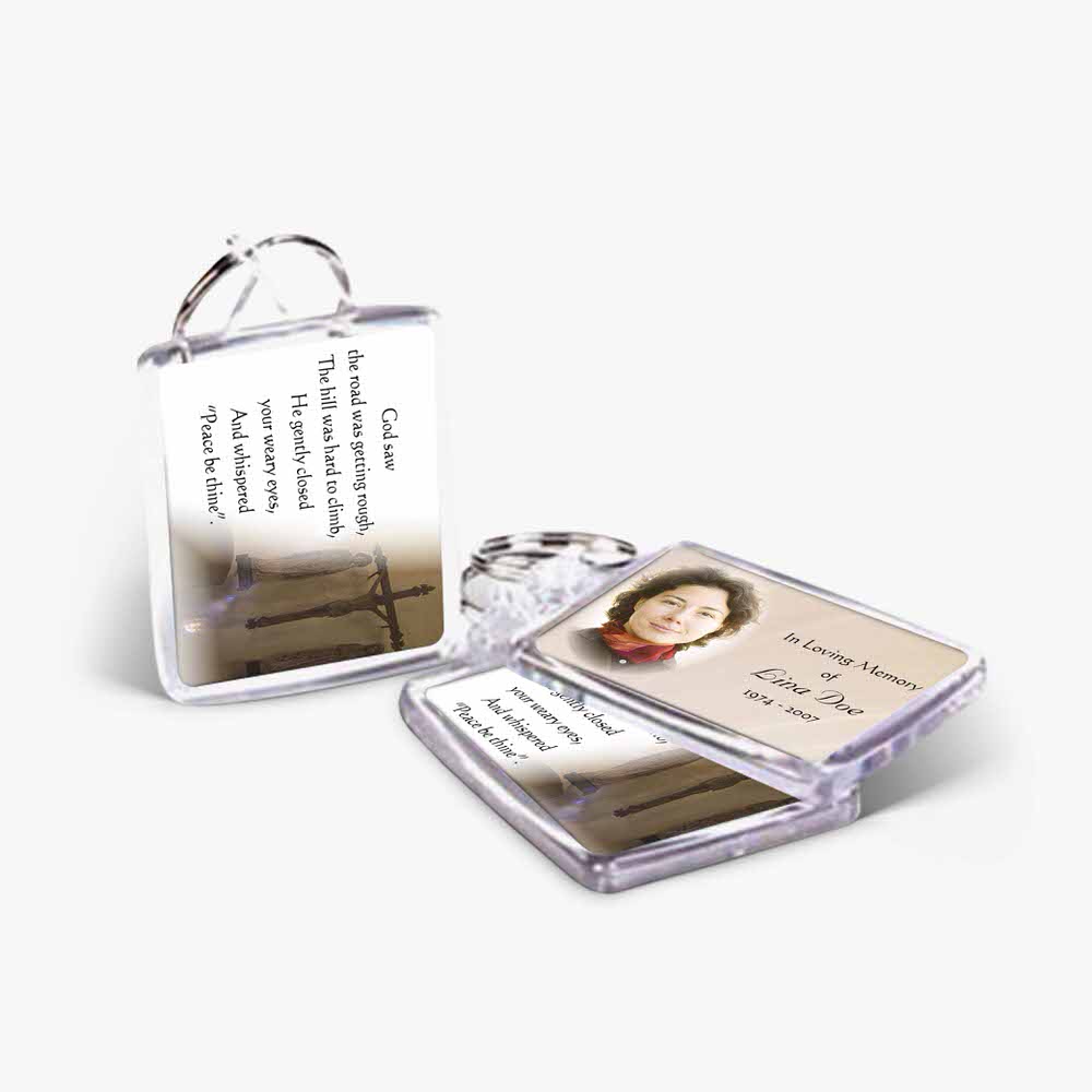 a key chain with a picture of a woman and a quote