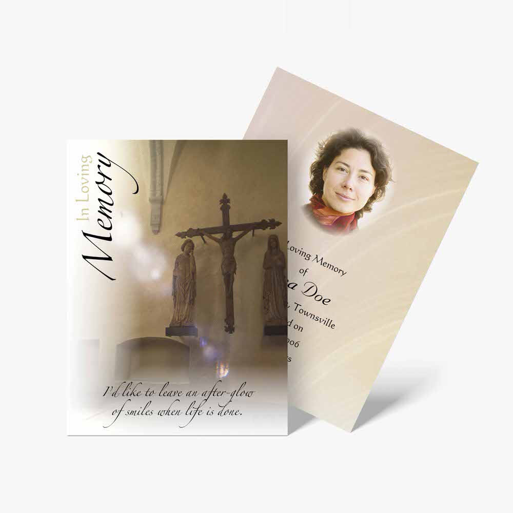 a memorial card with a photo of a cross