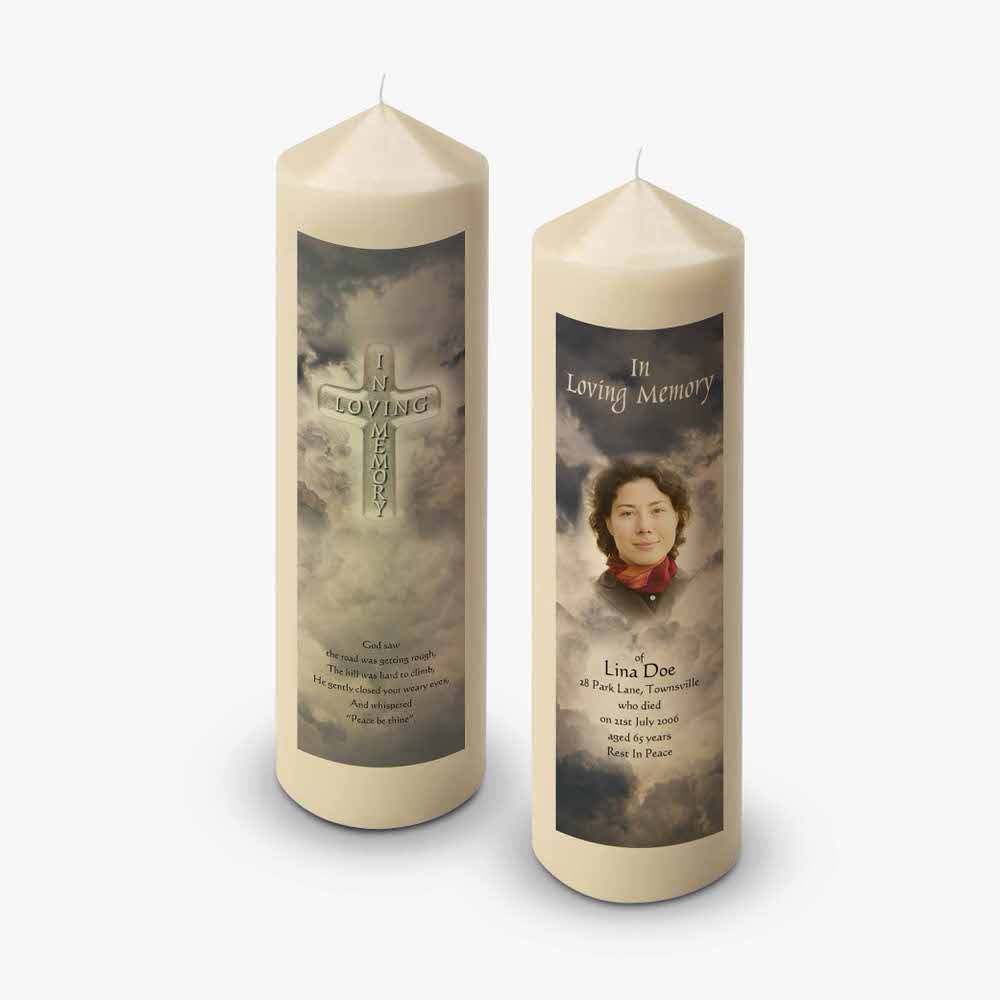 two candles with a photo of a woman on them