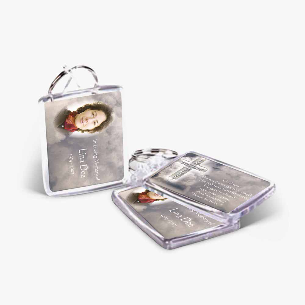 a photo keychain with a picture of a woman