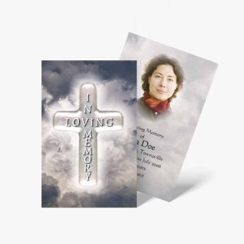 funeral cards with a cross and a photo of a woman in the clouds