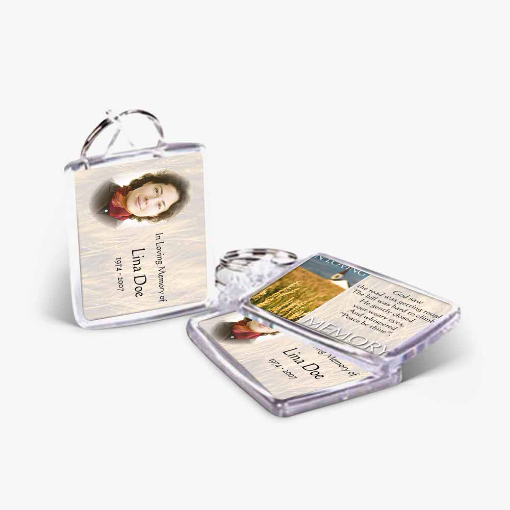a key chain with a picture of a woman and a card