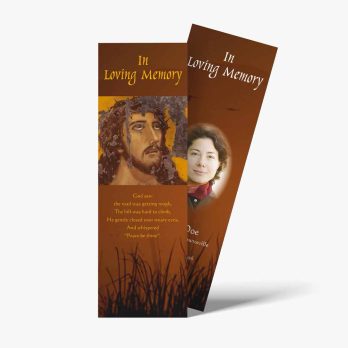 a bookmark with a picture of jesus and a woman in the grass