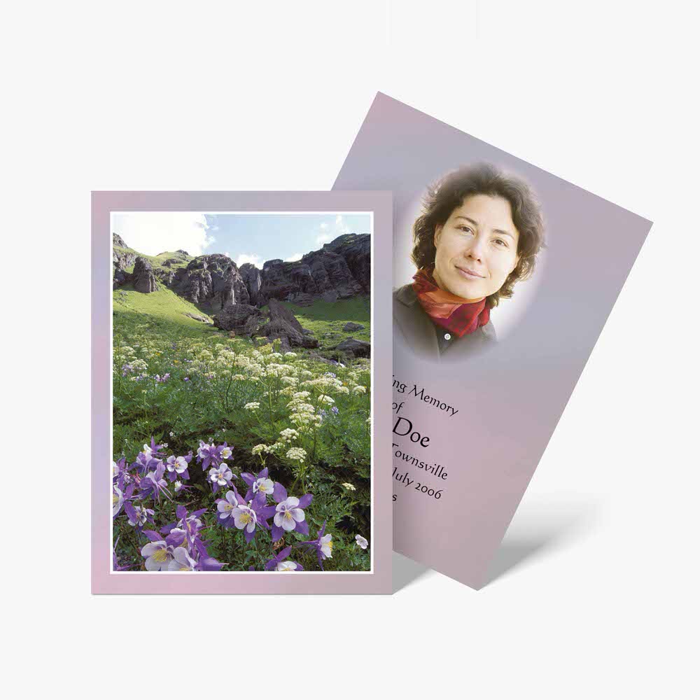 a photo of a woman in a field with purple flowers