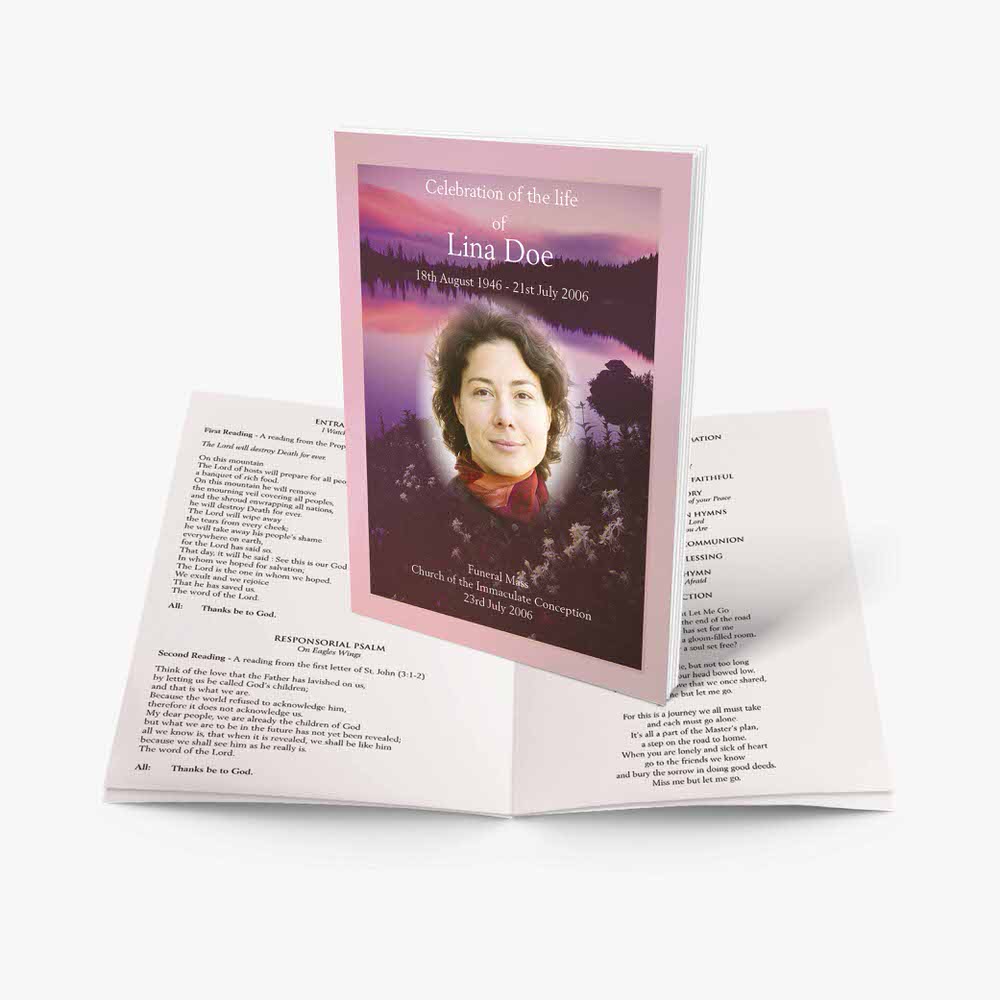 a pink booklet with a photo of a woman in a forest