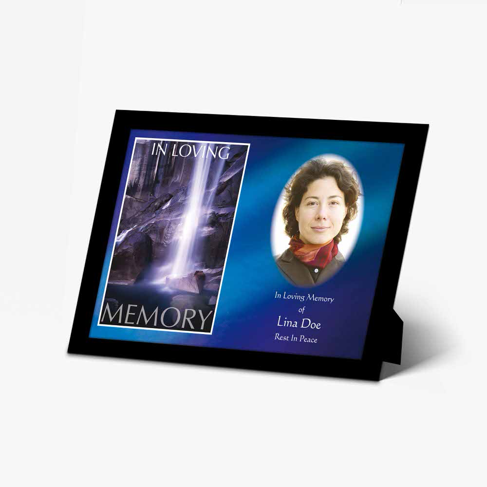 a memory photo frame with a waterfall and a woman's face