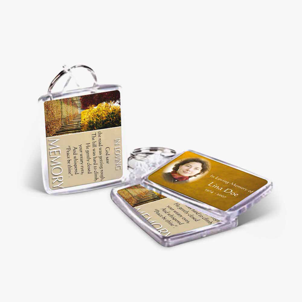 a key chain with a picture of a woman and a quote