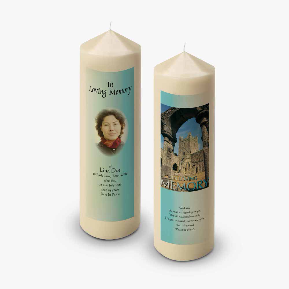 a candle with a photo of a woman on it