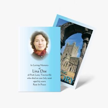 funeral card with photo of a woman in a blue dress