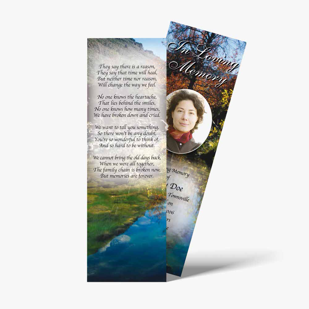 a bookmark with a photo of a woman in the mountains