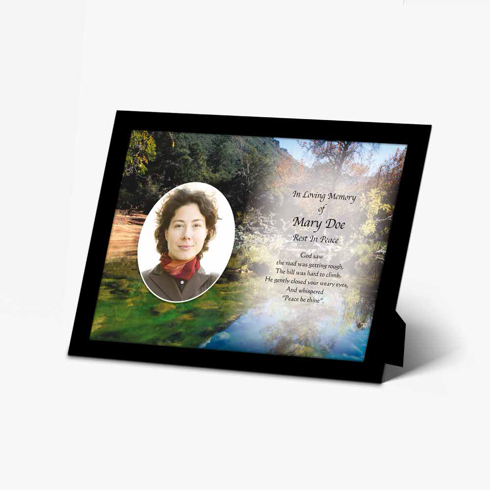 memorial photo frame with a photo of a woman in a park