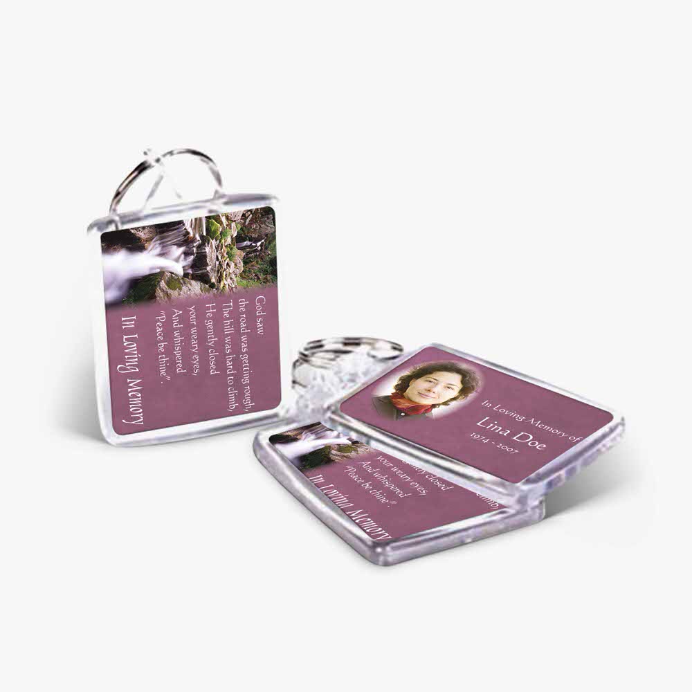 a keychain with a photo of a woman and a quote
