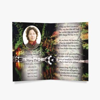 a beautiful memorial card with a photo of a woman in a forest