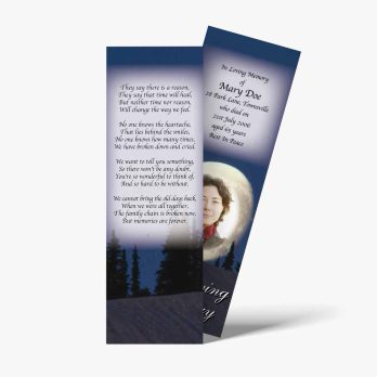 a bookmark with a photo of a woman in the woods