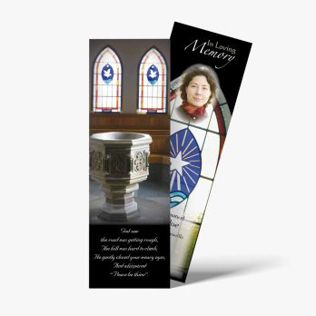 a bookmark with a photo of a church and a stained glass window