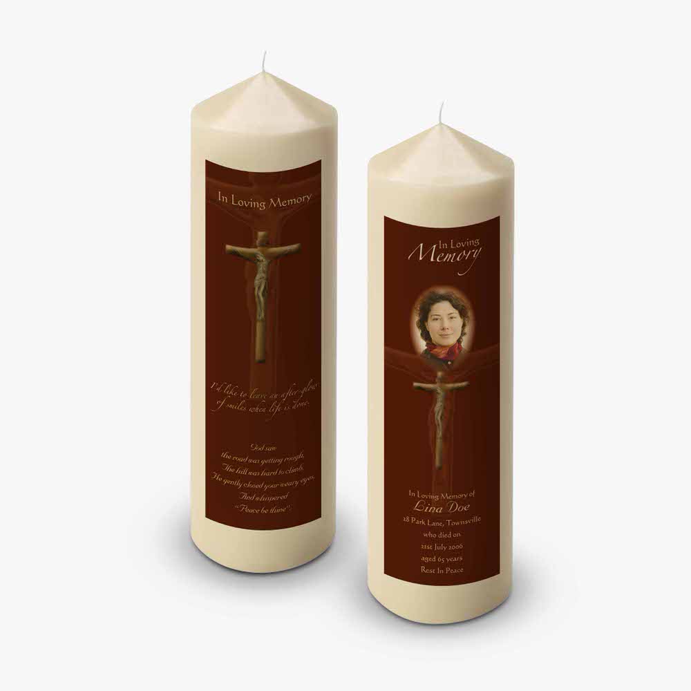 a pair of candles with a picture of a woman on them