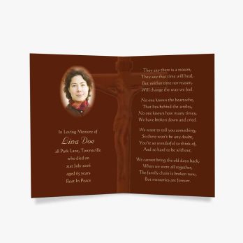 a brown prayer card with a photo of a woman on the cross