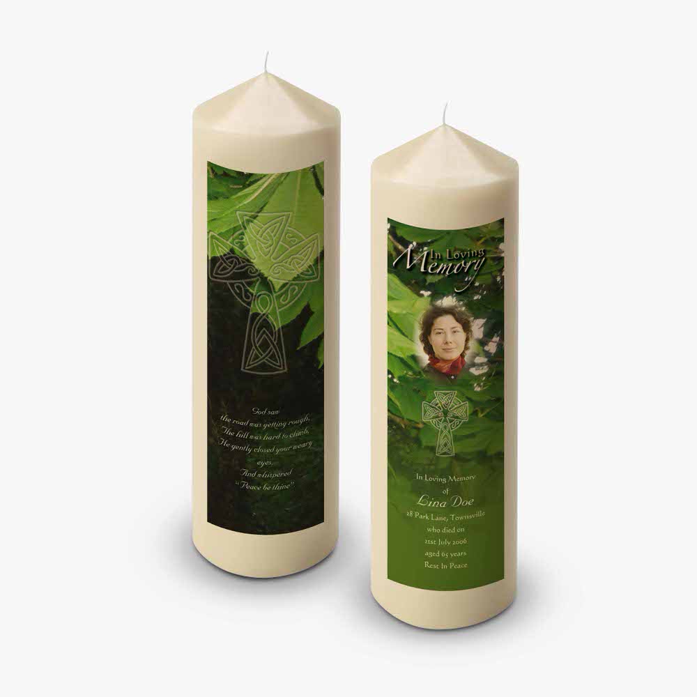 two candles with a picture of a woman on them