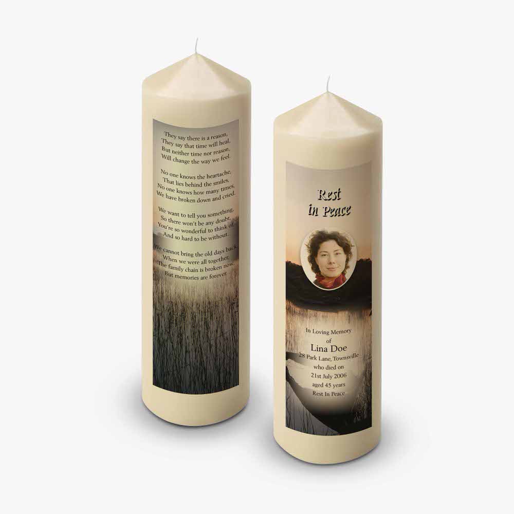 a funeral candle with a photo of a woman and a poem