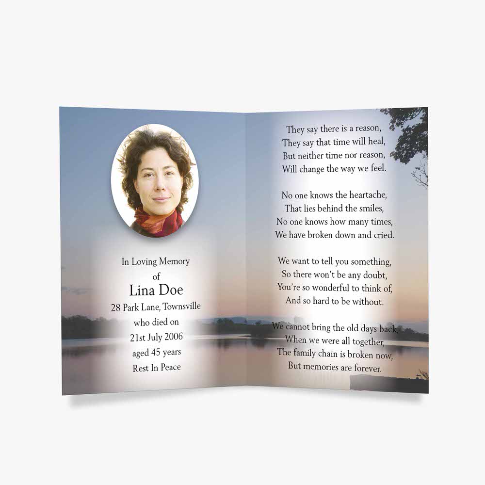 a beautiful memorial card with a photo of a woman in a lake