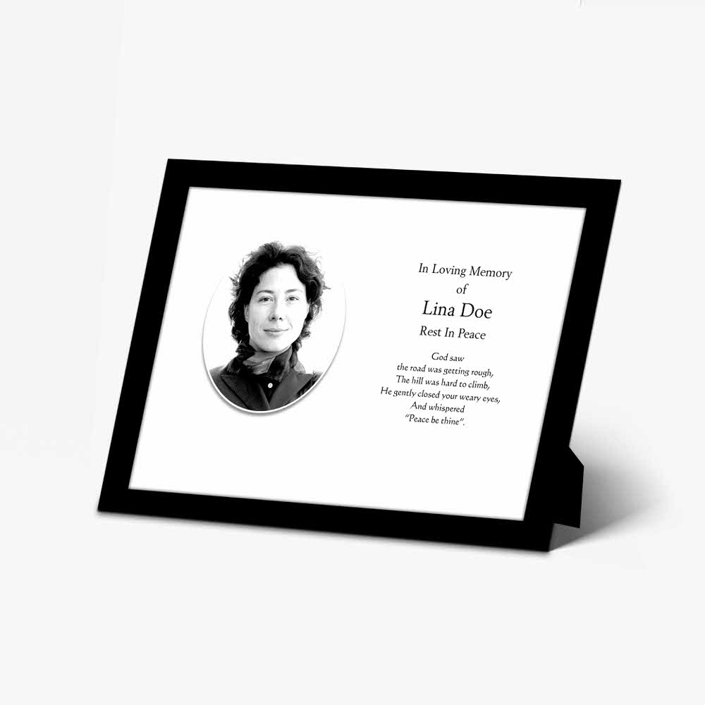 a black and white photo frame with a black and white photo of a woman in a black dress
