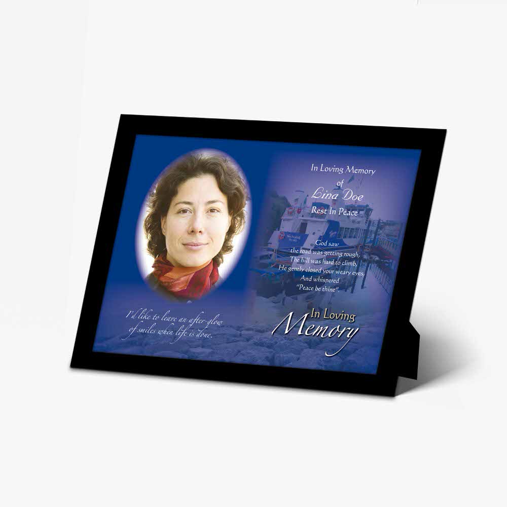 a memorial photo frame with a woman's picture