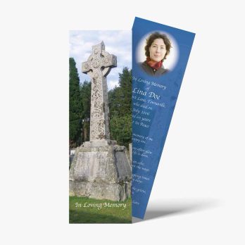 a bookmark with a photo of a cross and a person