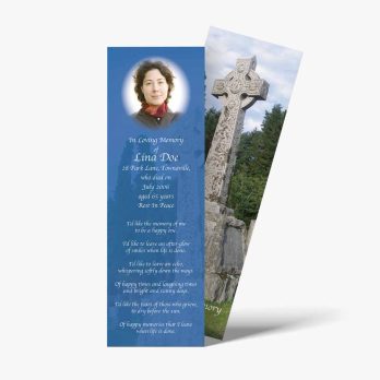 a bookmark with a photo of a woman in front of a cross