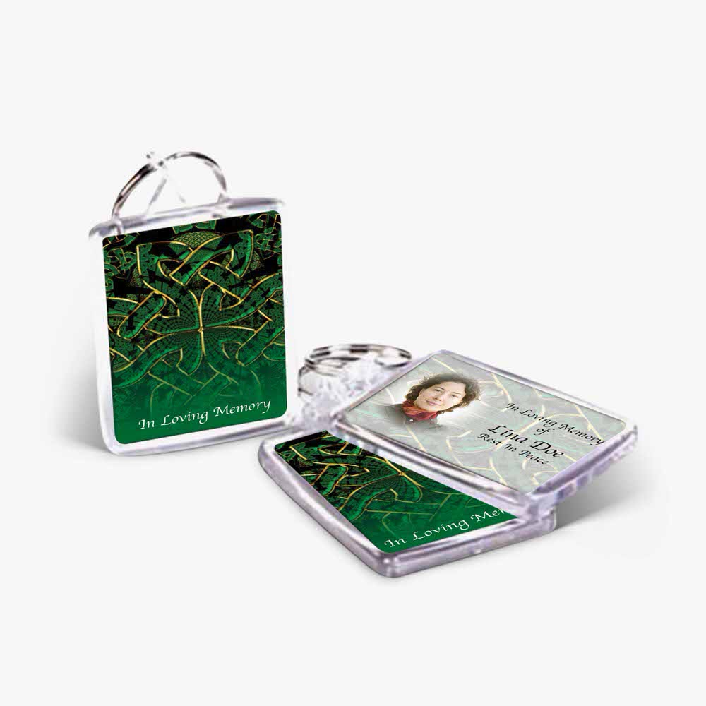 a key chain with a green and white design