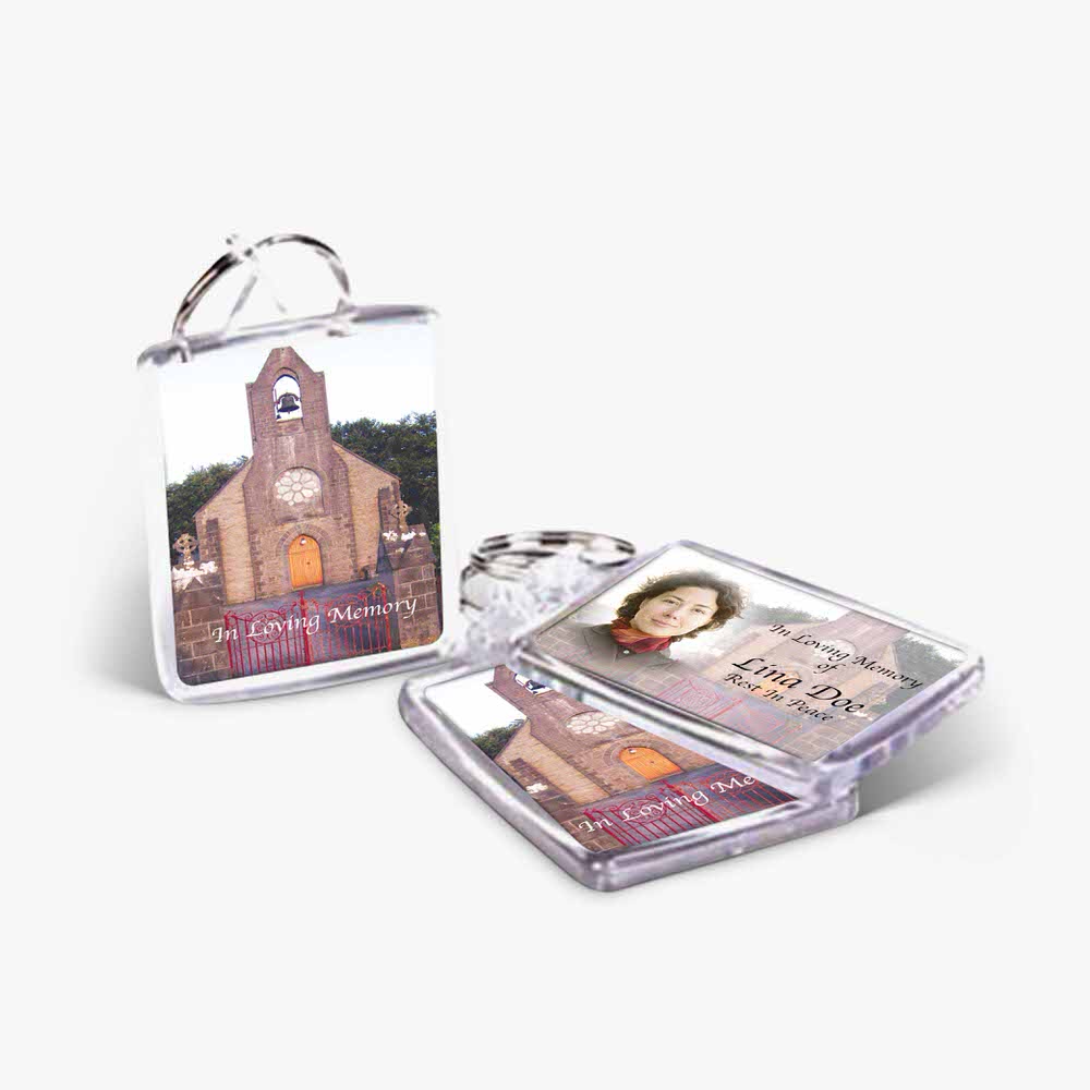 a photo key chain with a picture of a church