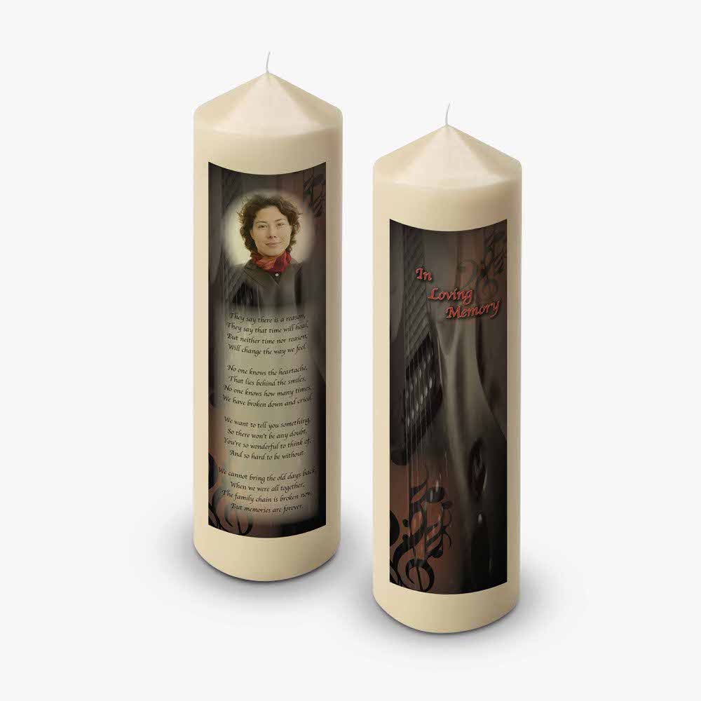 a candle with a picture of a man and a woman