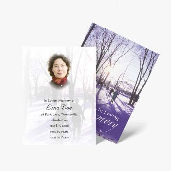 a funeral card with a photo of a woman in the snow