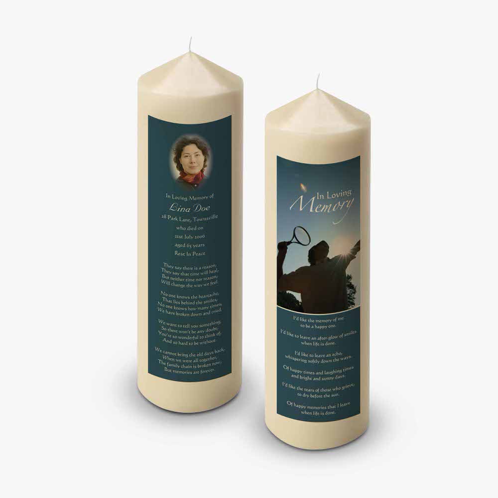 a memory candle with a photo of a man and a woman