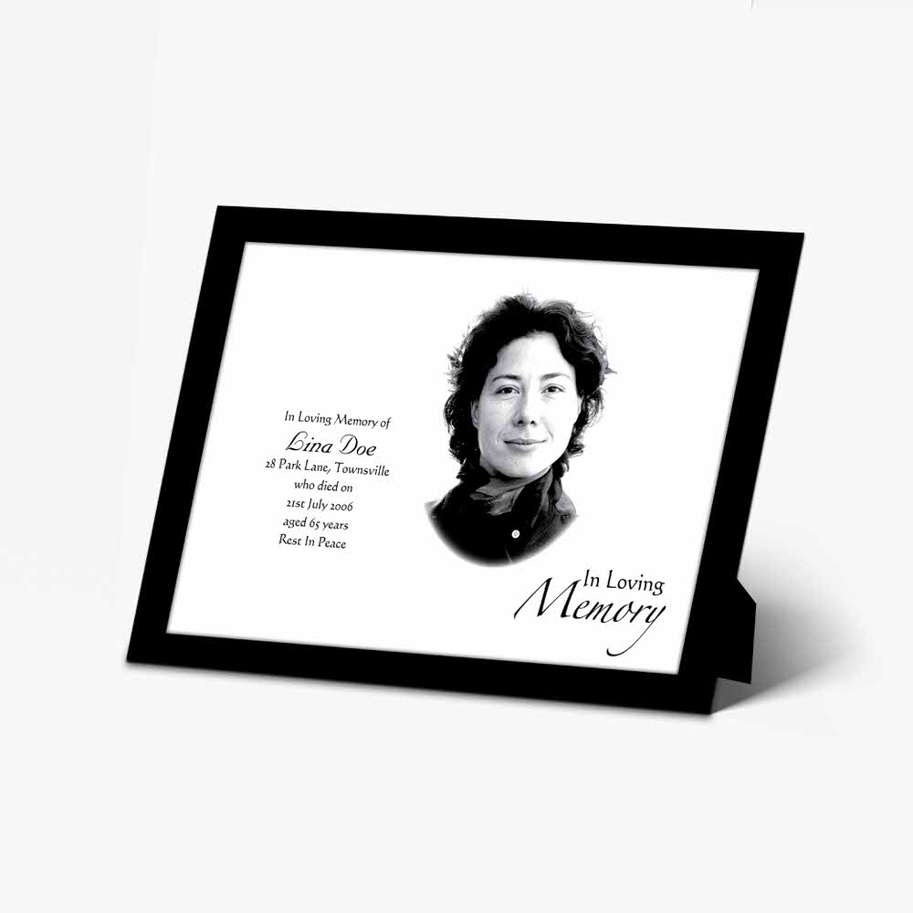 a memorial photo frame with a black and white photo of a woman