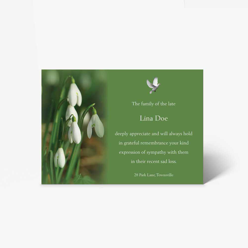 green funeral card with snowdrops