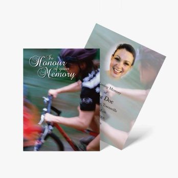 a memorial card with a photo of a woman riding a bike