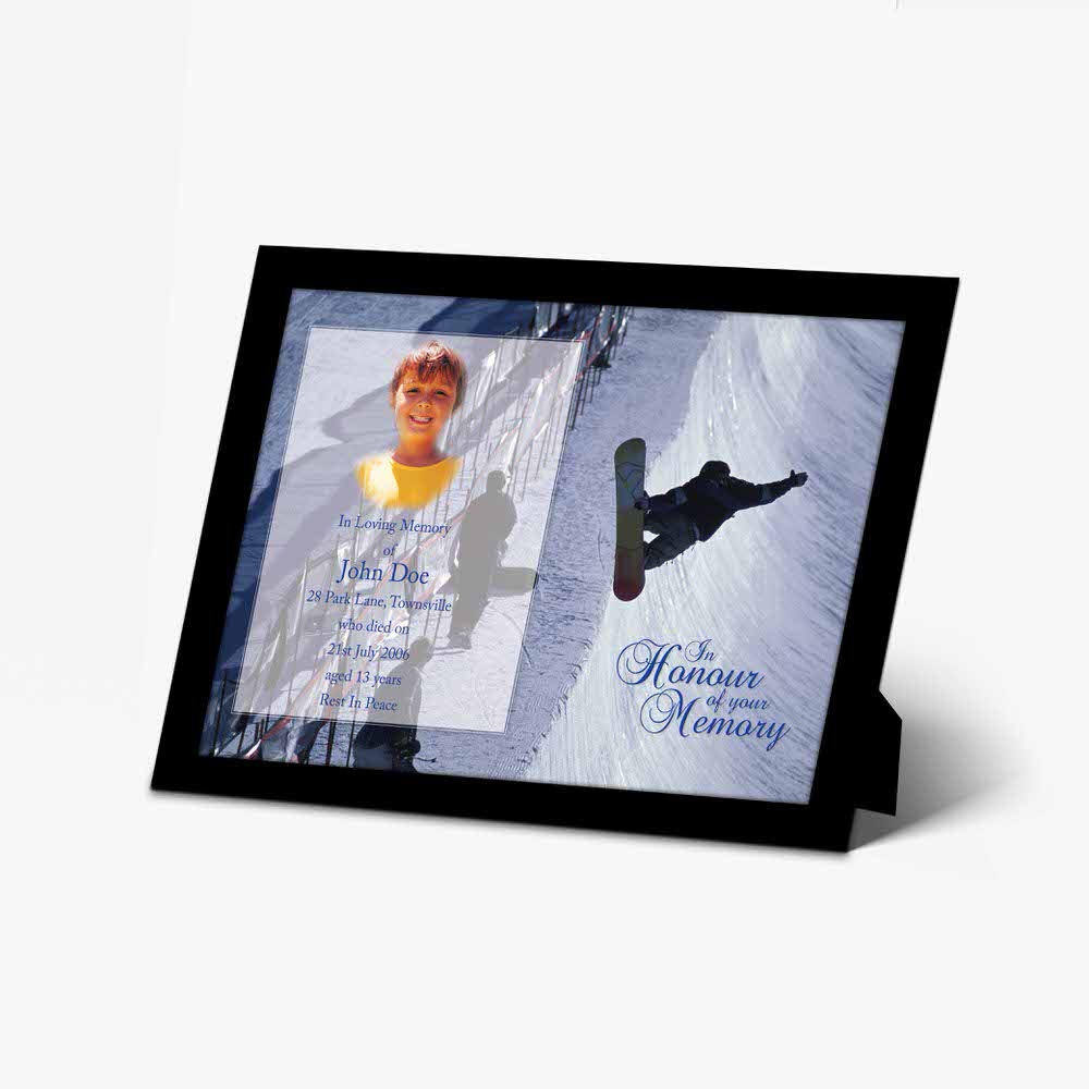 a photo frame with a snowboarder on it