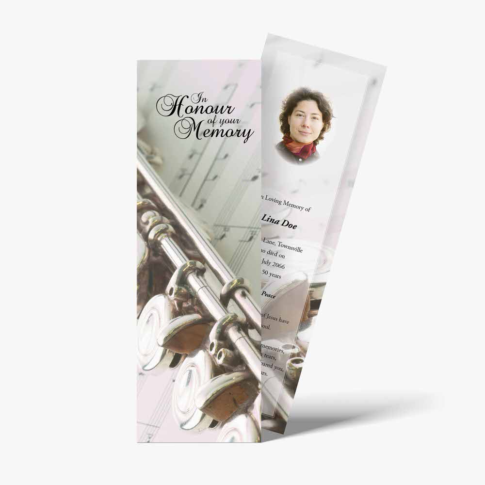 a funeral program with a picture of a flute