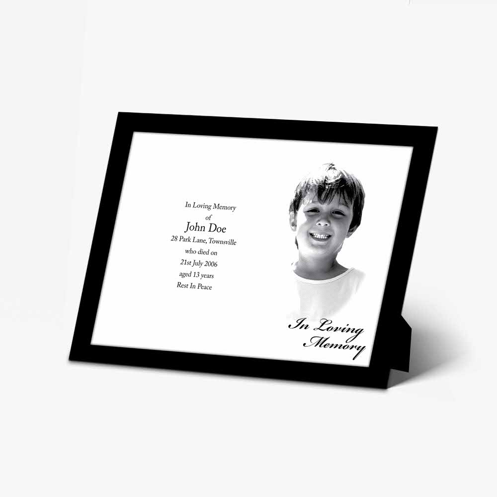 a black and white photo frame with a boy's face on it