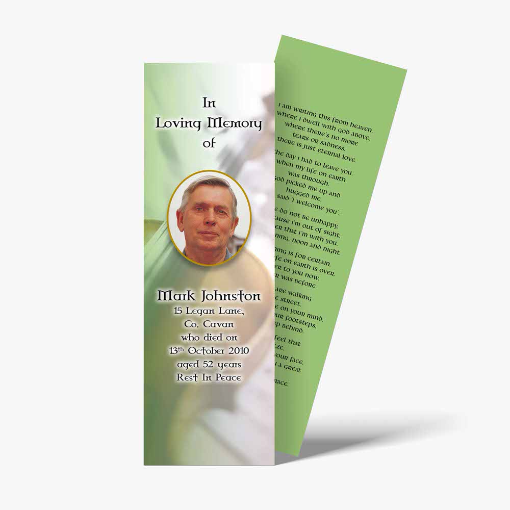 a funeral bookmark with a photo of a man