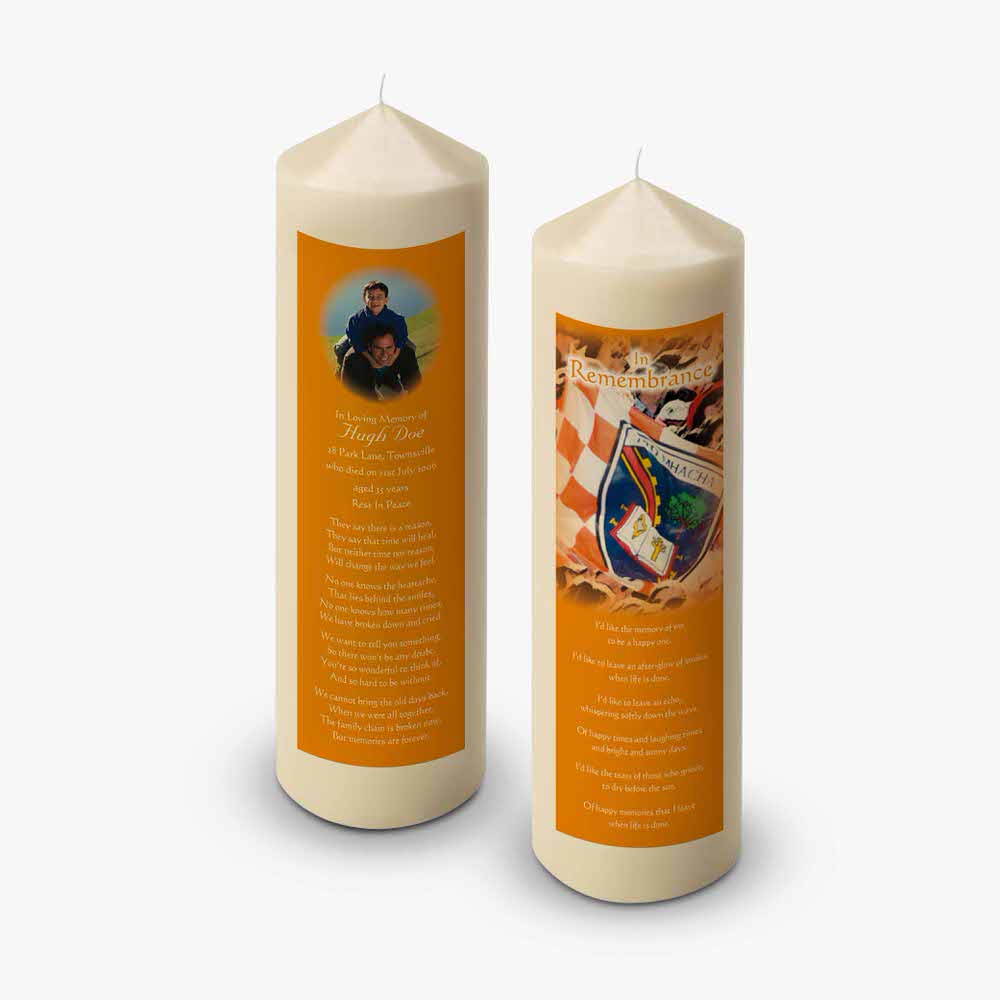 two candles with an image of a man and a woman on them